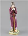 A Russian Gardner porcelain figure of a man holding a staff, mid 19th century, H.21.4cm, loss to left hand and replacement staff       