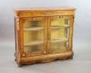 A Victorian ormolu mounted marquetry inlaid walnut bookcase, W.126cm D.38cm H.115cm                                                                                                                                         