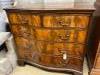 A George III style mahogany serpentine chest                                                                                                                                                                                