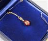 A cased Victor Mayer for Faberge 18ct gold, red enamel and diamond set egg pendant, on 18ct gold chain, numbered 142/500,              