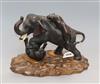 A Japanese Meiji period bronze figure of tigers attacking an elephant, signed, on carved wood base Height including base 21.5cm        