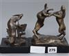 Two modern bronzes, boxing hares and an otter                                                                                          