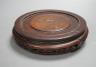 A Chinese carved hardwood stand 19cm                                                                                                                                                                                        