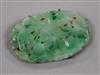 A Chinese white metal mounted carved jadeite brooch, 50mm.                                                                             