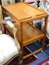 A 1960's metamorphic teak tea trolley W.68cm                                                                                           