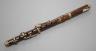 A rosewood piccolo, 32 cms long, stamped ‘for Keith Prowse Ltd. London’                                                                                                                                                     