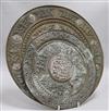 Two Himalayan Buddhist silver and brass circular plates                                                                                