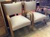 A pair of mid century elbow chairs                                                                                                                                                                                          