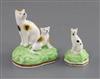 A Samuel Alcock group of a seated cat and kitten and a similar figure of a kitten, c.1840-50, H. 6.4cm and 4.3cm, slight faults        