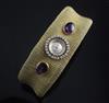 A lady's 18ct gold, cabochon amethyst and diamond set Zenith manual wind bracelet watch,                                               