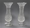 A pair of Edwardian baluster pineapple cut glass vases height 28cm                                                                     