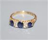 An early 20th century 18ct gold, sapphire and diamond set half hoop ring, size O/P.                                                    