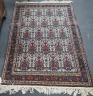 A Persian blue ground rug decorated with Zil-i-Soltan motifs on ivory fields, 106 x 152cm                                                                                                                                   