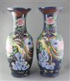 A pair of large Chinese blue ground 'dragon and phoenix' vases, 19th century, restorations                                             