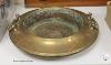 A circular brass two handled bowl, diameter 38cm                                                                                                                                                                            