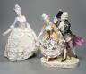 An Italian porcelain group of a dancing couple, 31cm, and an Italian maiolica figure of a lady                                                                                                                              
