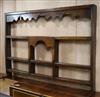 An 18th century style oak plate rack W.170cm                                                                                           