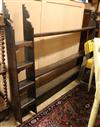 AN 18th century style oak plate rack W.221cm                                                                                           