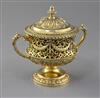 An Edwardian silver gilt two handled pedestal cup and cover by Nathan & Hayes, 12 oz.                                                  