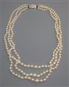 A triple strand graduated cultured pearl necklace, with paste set clasp, 40cm.                                                         