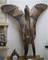 A large Senufo effigy carving of a standing bird height 127cm                                                                          