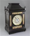 An Aesthetic movement ebonised architectural mantel clock, c.1885, height 20in.                                                        