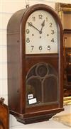 A 1920's oak wall clock H.66cm                                                                                                         