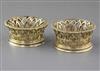 A pair of George V silver gilt bottle coasters by Pairpoint Brothers, 9 oz.                                                            