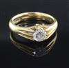 A 1930's 18ct gold and claw set solitaire diamond ring, size U.                                                                        