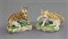 A pair of Derby porcelain figures of a tiger and a leopard, c. 1820-30, L. 5.8cm - 6.7cm, restorations                                 