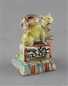 A Chinese enamelled porcelain 'cat' joss-stick holder, 18th century, H. 7cm                                                            