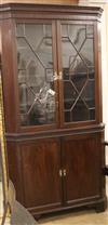 A George III design mahogany corner cupboard W.112cm                                                                                   