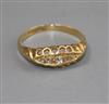 An early 20th century 18ct gold and five stone diamond ring, size L/M                                                                  