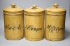 Kitchenalia - Three German painted metal storage jars, height 29cm                                                                                                                                                          