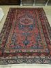 A Caucasian design red ground Kelim rug, 280 x 174cm                                                                                                                                                                        