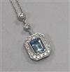 A modern Italian 18ct white gold, aquamarine and diamond set octagonal drop pendant, on a fine link chain, pendant 30mm.               