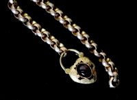 A Victorian facetted gold link bracelet, with associated? engraved gold and cabochon garnet set heart shaped padlock clasp,            