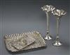 Two late 19th/early 20th century repousse silver trays, a pair of silver spill vases and a silver napkin ring.                         