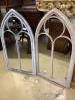 A pair of metal framed lancet arched wall mirrors, width 60cm height 110cm                                                                                                                                                  