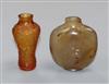 A Chinese agate snuff bottle and an amber glass snuff bottle                                                                           