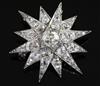 A Belle Epoque diamond starburst brooch, the graduated old-cut diamonds in platinum setting, 37mm.                                     