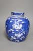 An early 20th century Chinese blue and white prunus jar and cover, height 26cm                                                                                                                                              