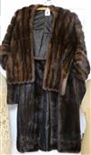 A dark brown mink coat and an evening sleeved mink stole                                                                               