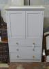 A painted pine press cupboard, width 100cm                                                                                                                                                                                  