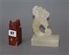 A carved alabaster cornucopia ornament, a carved red soapstone chop height 14cm                                                        