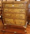 A reproduction walnut bachelor's chest W.64cm                                                                                          