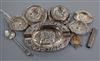 Two pierced repousse silver nut dishes, a silver dish, two Dutch white metal dishes and six other plated items.                        