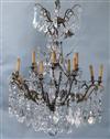 An Italian bronze and cut glass twelve light chandelier, overall drop 4ft Diam. 3ft                                                    