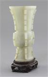 A Chinese archaistic pale celadon jade beaker vase                                                                                     