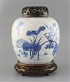 A Chinese blue and white ovoid jar, Kangxi period, H. 20.5cm, excluding wood stand and cover                                           